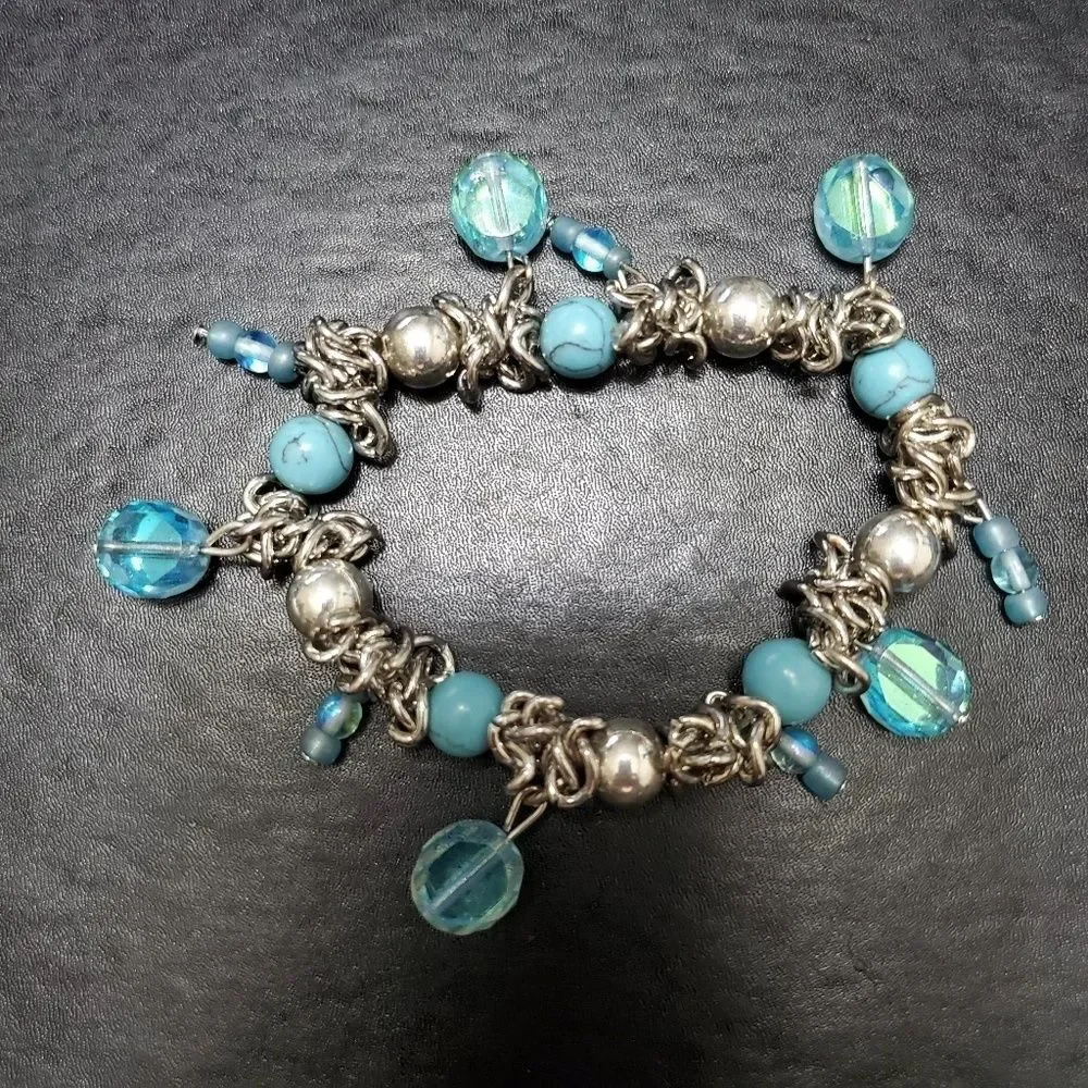Child's silver tone blue bead bracelet 6